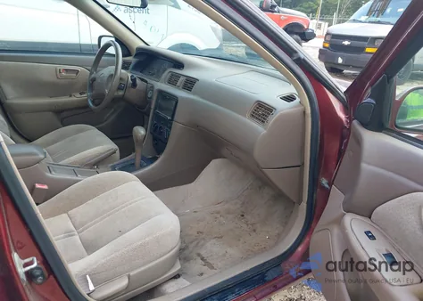 2000 Toyota Camry Le from USA, damaged, VIN 4T1BG22K4YU993484